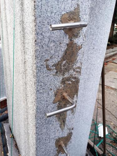 Underside of wall section showing stainless foundation steel pins